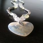 White And Clear Natural Stone Heart Pendant..